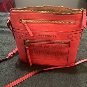Salmon pink cross body bag and matching wallet